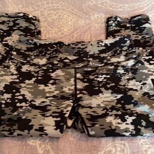 2 pair of crop leggings. 1 is Reebok 1 is RBX.